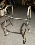 Invacare Folding Walker W/2 Release Buttons W/5" Wheels. Delivery An Option. Fixed Price $21.00.