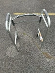 Guardian Two-button Folding Walkers With Front Wheels And Back Glide Skis. Fixed Price $10.00.