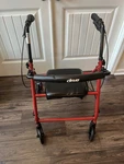 Drive Red 4-WHEEL Rollator Walker With Seat, Handbrakes, Adjustable Handles. Fixed Price $185.99.
