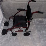 Drive Medical Fly Lite Ultra Lightweight Transport Wheelchair, Burgundy. Fixed Price $120.00.