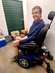 Pride Jazzy Elite 14 Power Wheelchair, Blue. Fixed Price $1100.00.