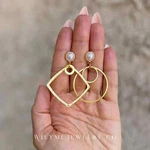 Clarity Asymmetric Pearl Hoops Square And Circle Earrings. Fixed Price $125.00.