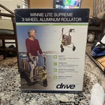 Drive Medical Winnie Lite Supreme 3 Wheel Rollator Rolling Walker, Tan/plaid. Fixed Price $115.00.