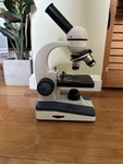 Celestron Labs Monocular Head Compound Microscope 40-1000X CM1000. Fixed Price $55.00.