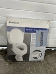 Homecraft Savanah Raised Toilet Seat 2" With Lid. Fixed Price $30.00.