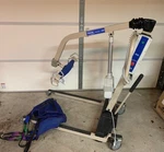 Never Used Invacare Reliant 450 Battery Powered Patient Lift W/ Full Body Sling. Fixed Price $450.00.