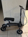 Kneerover Adjustable Height Walker Scooter 4 Wheels Hand Brake Black. Fixed Price $49.95.