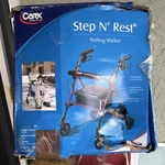 Carex Step N' Rest Rollator, Adjustable Seat, Hand Brakes, Red/black, 4-WHEEL. Fixed Price $129.99.