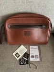 Burberrys Vintage Classic Brown Leather Clutch Bag With Strap Nova Check Inside. Fixed Price $325.00.