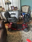 Red Vive 4 Wheel Mobility Scooter 265 Lb Cap Basket Headlight Swivel Seat. Fixed Price $575.00.