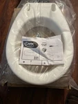 Carex Elevated Seat, B307, Lightweight White Plastic, Elongated. Fixed Price $15.00.