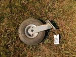 Caster Dolly Wheel (holds Air) Tag #1513. Fixed Price $36.00.